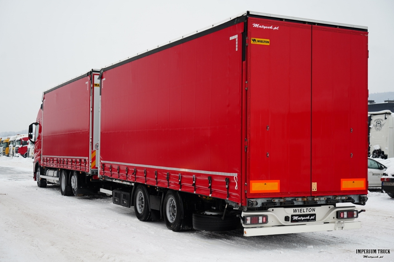 VOLVO FH 460 / ZESTAW TANDEM / 120 M3 / PRZEJAZDOWY / KLIMA POSTOJOWA / OŚ PODNOSZONA SKRĘTNA / WIELTON 2021 ROK / - Curtainsider truck: picture 5 VOLVO FH 460 / ZESTAW TANDEM / 120 M3 / PRZEJAZDOWY / KLIMA POSTOJOWA / OŚ PODNOSZONA SKRĘTNA / WIELTON 2021 ROK / - Curtainsider truck: picture 5