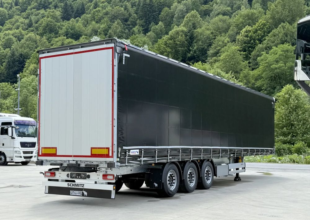 Schmitz Cargobull VARIOS + SKRZYNKA - Curtainsider semi-trailer: picture 2 Schmitz Cargobull VARIOS + SKRZYNKA - Curtainsider semi-trailer: picture 2