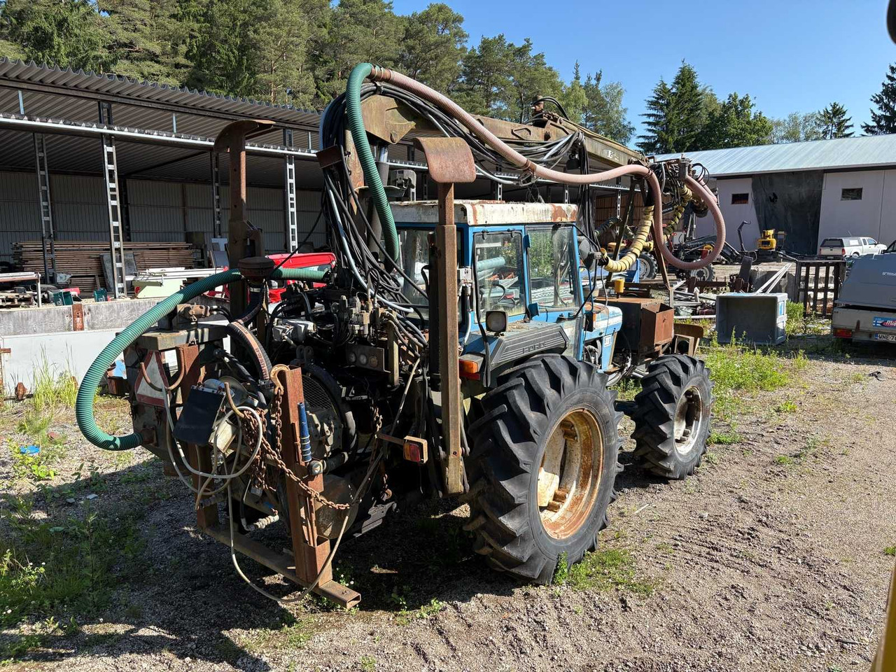 Rock drill Doofor DF530S and Tractor Ford New Holland 5610 - Drilling rig: picture 4 Rock drill Doofor DF530S and Tractor Ford New Holland 5610 - Drilling rig: picture 4