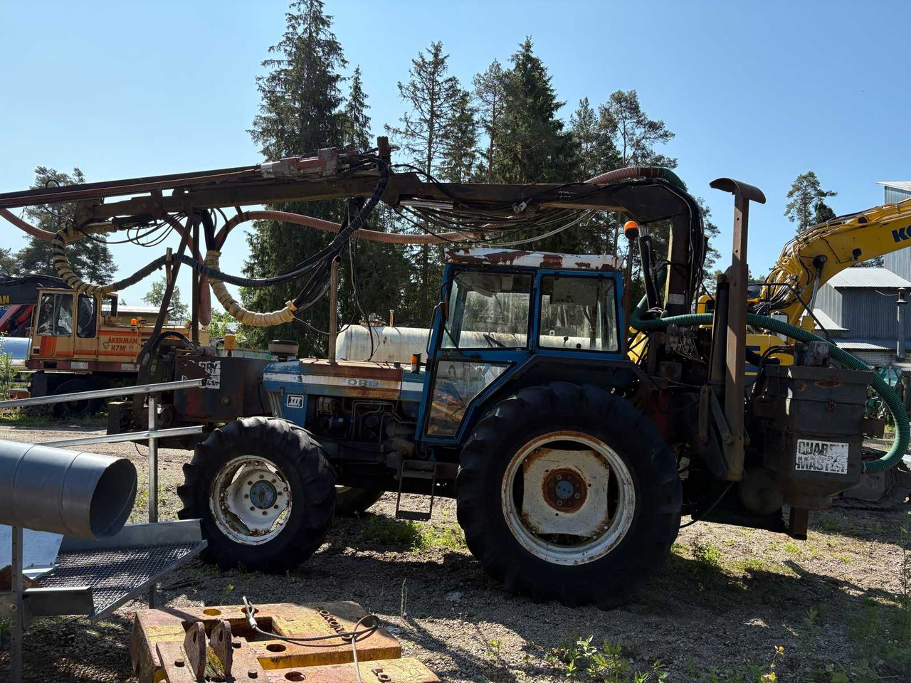 Rock drill Doofor DF530S and Tractor Ford New Holland 5610 - Drilling rig: picture 5 Rock drill Doofor DF530S and Tractor Ford New Holland 5610 - Drilling rig: picture 5