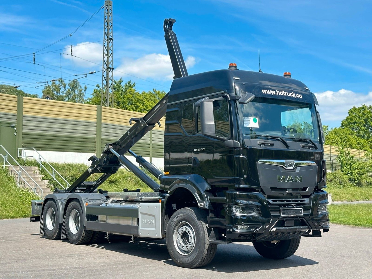 MAN TGS 33.520 6X4 Euro6e Abrollkipper MULTILIFT - Hook lift truck, Crane truck: picture 1 MAN TGS 33.520 6X4 Euro6e Abrollkipper MULTILIFT - Hook lift truck, Crane truck: picture 1