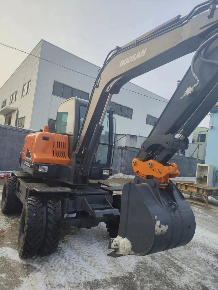 DOOSAN DX60w-9c - Mini excavator: picture 1 DOOSAN DX60w-9c - Mini excavator: picture 1