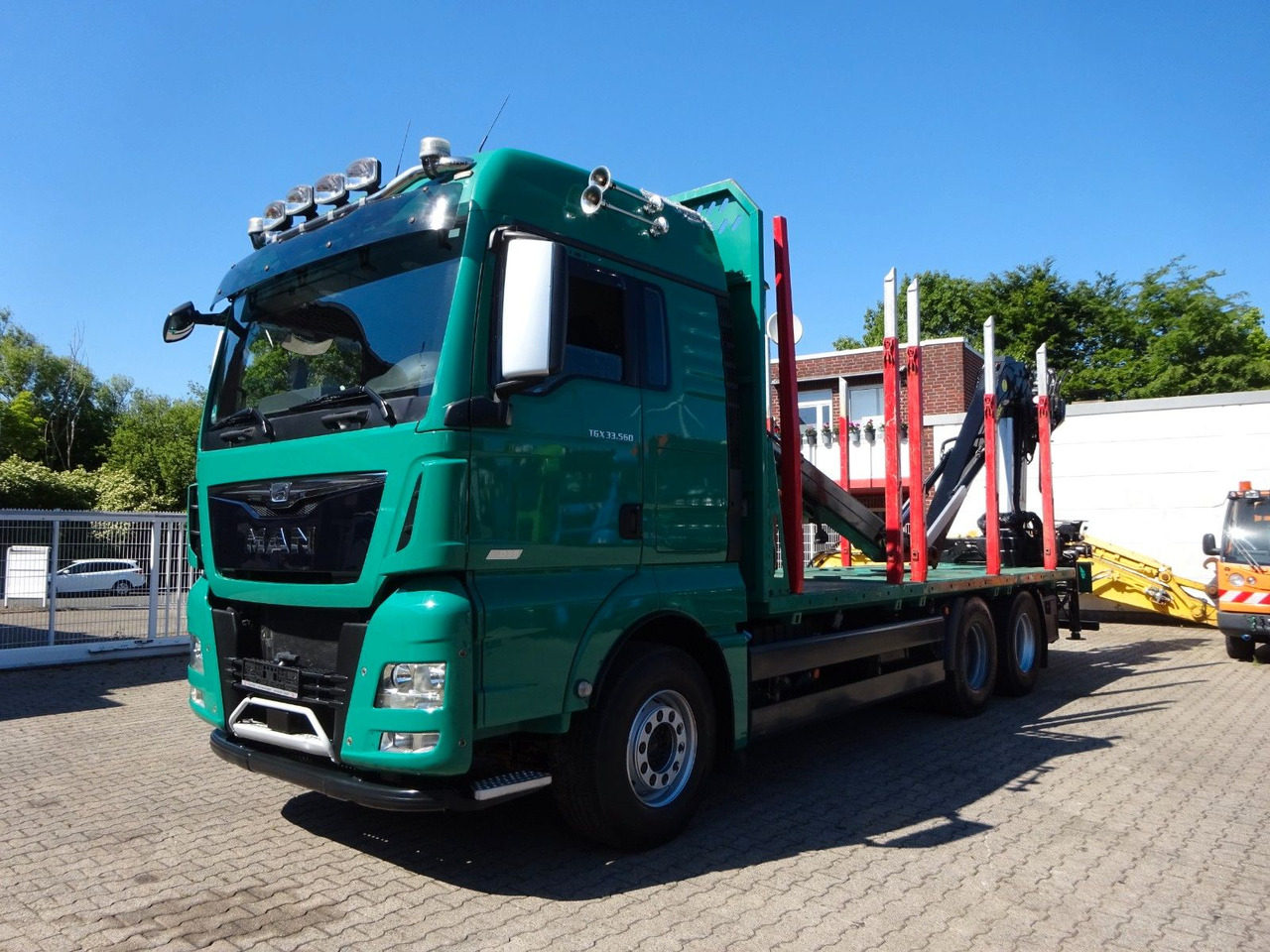 MAN 33.560 TGX mit TAJFUN L150Z Holzladekran 6x4 - Logging truck, Crane truck: picture 2 MAN 33.560 TGX mit TAJFUN L150Z Holzladekran 6x4 - Logging truck, Crane truck: picture 2