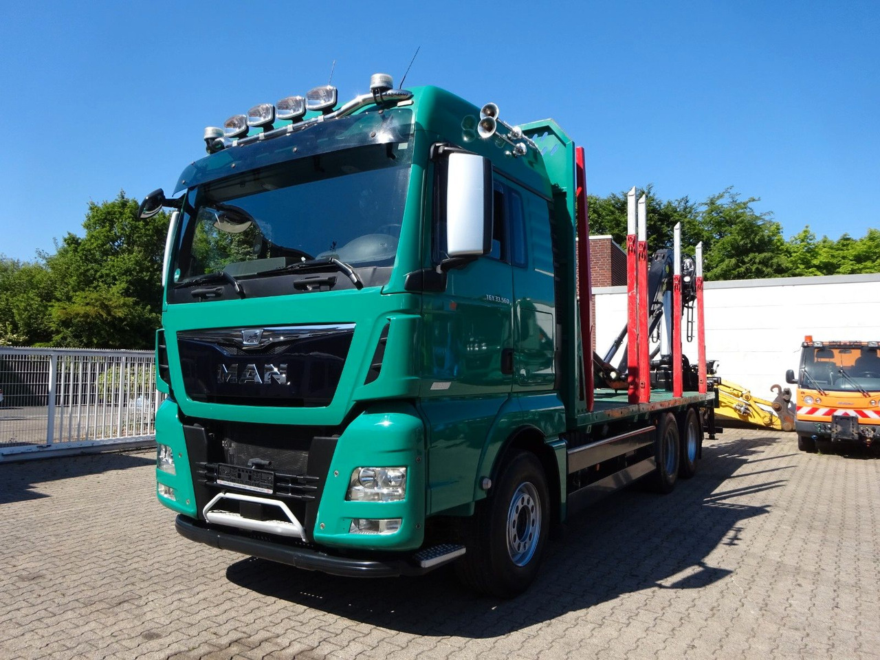 MAN 33.560 TGX mit TAJFUN L150Z Holzladekran 6x4 - Logging truck, Crane truck: picture 1 MAN 33.560 TGX mit TAJFUN L150Z Holzladekran 6x4 - Logging truck, Crane truck: picture 1