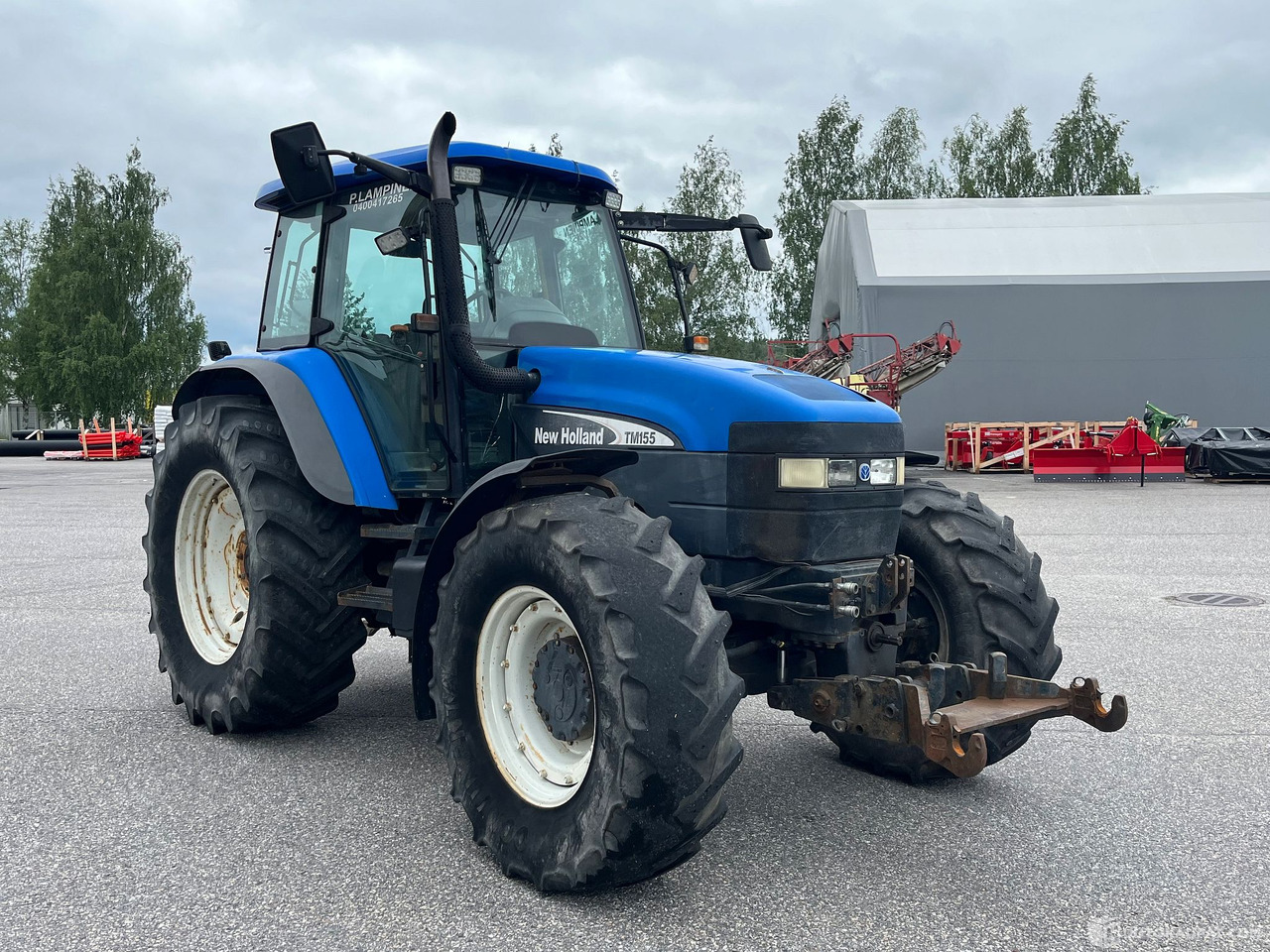 New Holland TM155, traktori etunostolaitteeella, 2004,, Salo - Agricultural machinery: picture 4 New Holland TM155, traktori etunostolaitteeella, 2004,, Salo - Agricultural machinery: picture 4