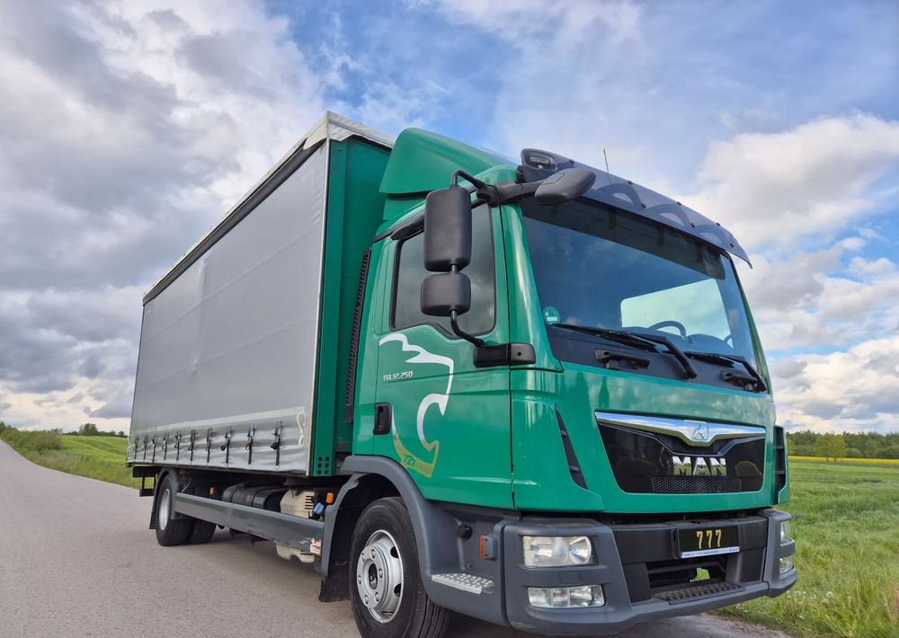 MAN TGL 12.250 6.2m AUTOMAT KLIMA z Niemiec ESP nowe opony EURO 6 / 4.75 rozstaw / zawiesie na wózek widłowy / TOP STAN / okazja nauka jazdy MOŻLIWOŚĆ DOSTOSOWANIA 12t - Curtainsider truck: picture 1 MAN TGL 12.250 6.2m AUTOMAT KLIMA z Niemiec ESP nowe opony EURO 6 / 4.75 rozstaw / zawiesie na wózek widłowy / TOP STAN / okazja nauka jazdy MOŻLIWOŚĆ DOSTOSOWANIA 12t - Curtainsider truck: picture 1