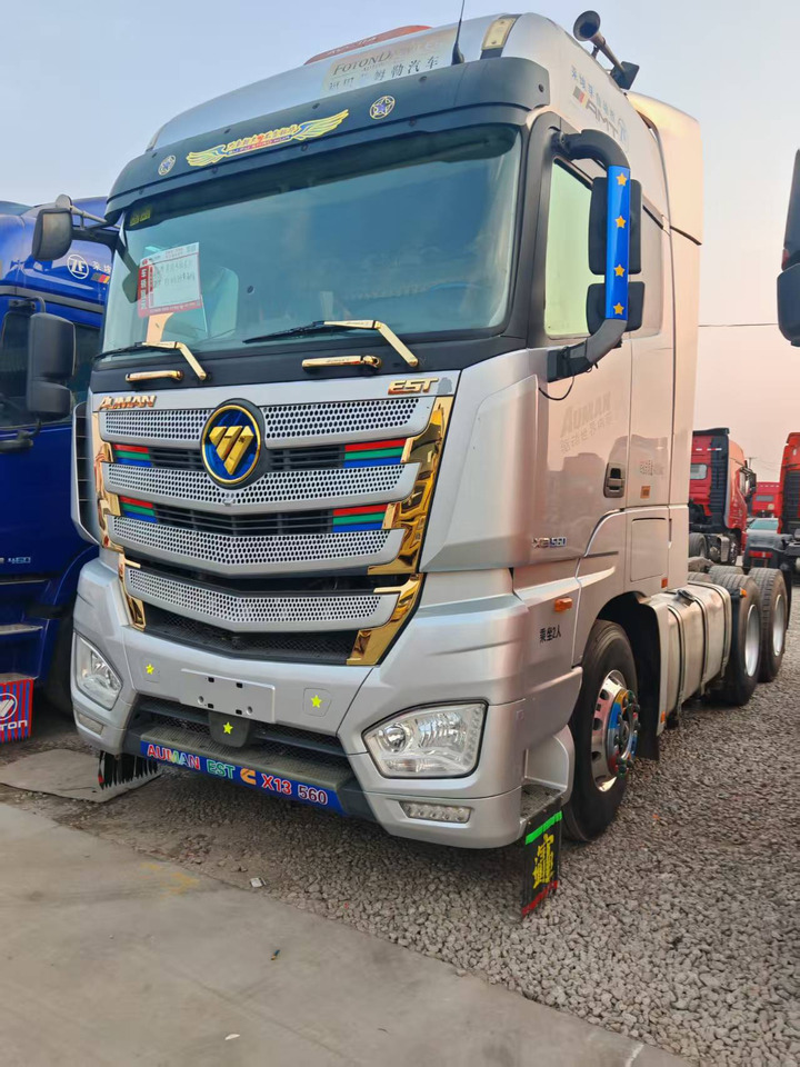 AUMAN 560HP - Tipper semi-trailer: picture 1 AUMAN 560HP - Tipper semi-trailer: picture 1