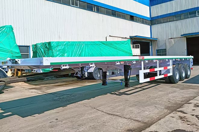 TITAN 3 Axle 40 Ft Flatbed Trailer for Sale in Mauritania - Container transporter/ Swap body semi-trailer: picture 3 TITAN 3 Axle 40 Ft Flatbed Trailer for Sale in Mauritania - Container transporter/ Swap body semi-trailer: picture 3