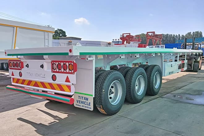 TITAN 3 Axle 40 Ft Flatbed Trailer for Sale in Mauritania - Container transporter/ Swap body semi-trailer: picture 2 TITAN 3 Axle 40 Ft Flatbed Trailer for Sale in Mauritania - Container transporter/ Swap body semi-trailer: picture 2