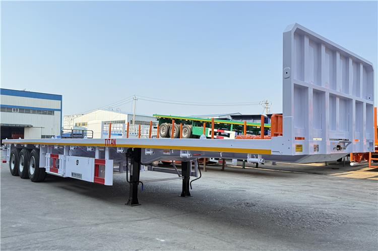 TITAN 3 Axle Flatbed Semi Trailer with Front Wall for Sale In Dominican - Container transporter/ Swap body semi-trailer: picture 1 TITAN 3 Axle Flatbed Semi Trailer with Front Wall for Sale In Dominican - Container transporter/ Swap body semi-trailer: picture 1