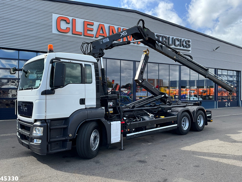MAN TGS 26.360 6x4 Hiab 12 Tonmeter laadkraan - Hook lift truck, Crane truck: picture 1 MAN TGS 26.360 6x4 Hiab 12 Tonmeter laadkraan - Hook lift truck, Crane truck: picture 1