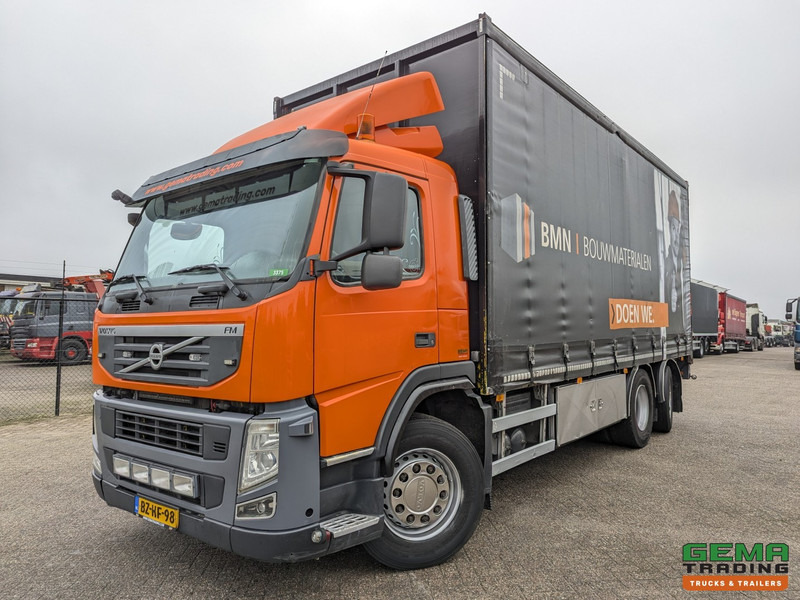 Volvo FM330 6x2/4 Daycab Euro5 EEV - SchuifzeilenBak 6.7m. - KooiAap Aansluiting - HH Vloer - Rongen - Curtainsider truck: picture 1 Volvo FM330 6x2/4 Daycab Euro5 EEV - SchuifzeilenBak 6.7m. - KooiAap Aansluiting - HH Vloer - Rongen - Curtainsider truck: picture 1