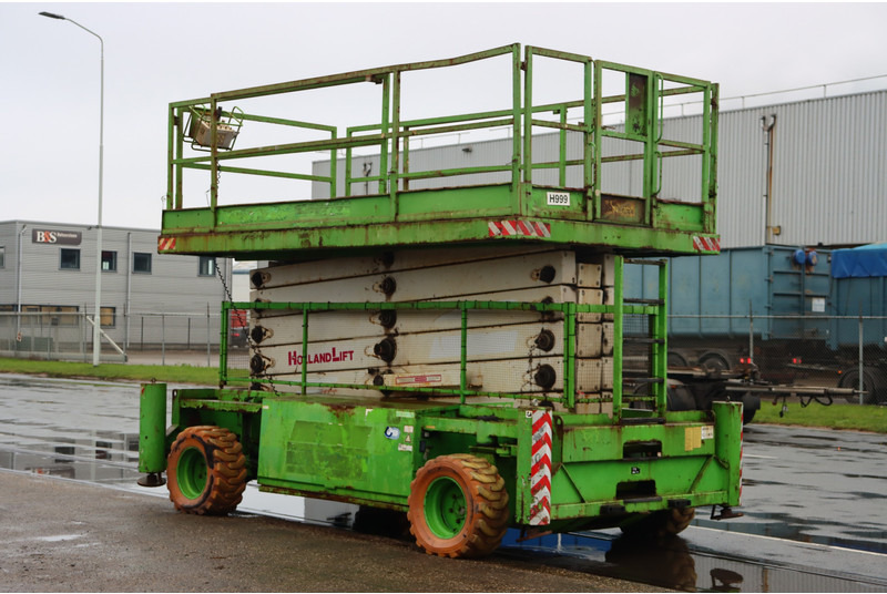 Holland lift B-195DL25 - Scissor lift: picture 1 Holland lift B-195DL25 - Scissor lift: picture 1