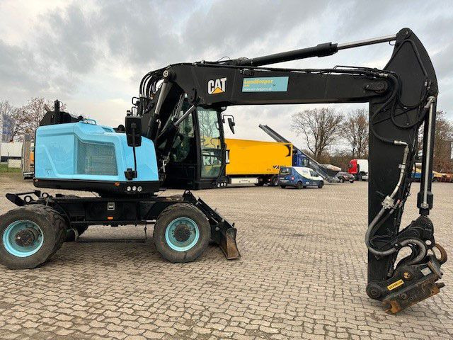 CAT M315F, OilQuick, Hammer- u- Greifersteuerung - Wheel excavator: picture 2 CAT M315F, OilQuick, Hammer- u- Greifersteuerung - Wheel excavator: picture 2