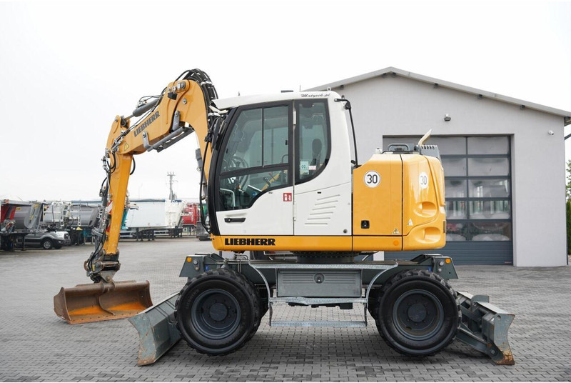 Liebherr 910 COMPACT LITRONIC  / KOPARKA KOŁOWA / KLIMATYZACJA / KAMERA - Wheel excavator: picture 2 Liebherr 910 COMPACT LITRONIC  / KOPARKA KOŁOWA / KLIMATYZACJA / KAMERA - Wheel excavator: picture 2