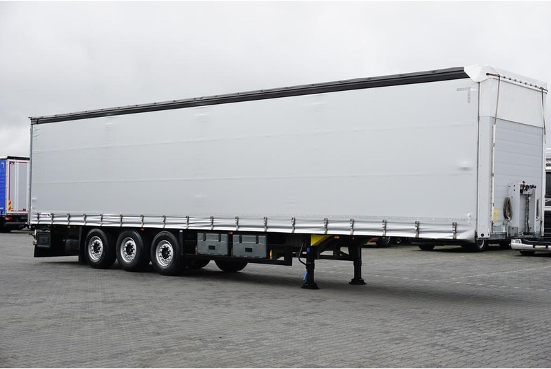 Schmitz Cargobull FIRANKA / MULTI LOCK / XL / OŚ PODNOSZONA - Curtainsider semi-trailer: picture 4 Schmitz Cargobull FIRANKA / MULTI LOCK / XL / OŚ PODNOSZONA - Curtainsider semi-trailer: picture 4