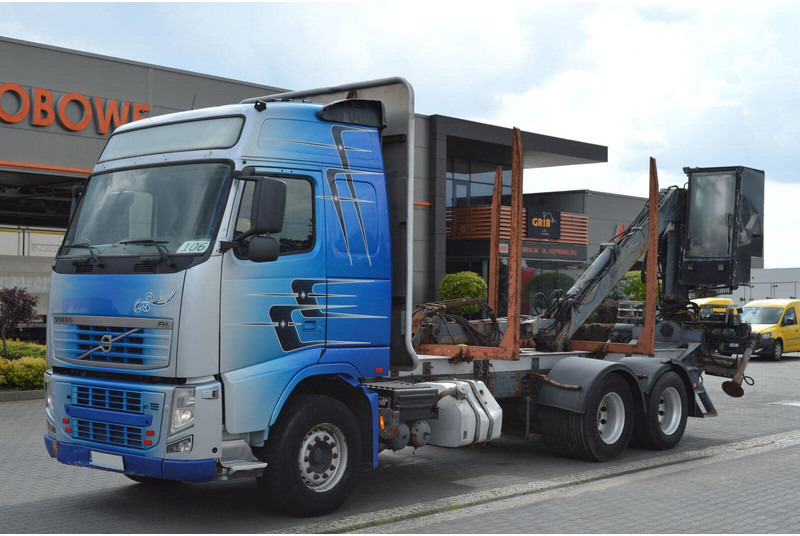 Volvo FH 13 520 FOR TRANSPORTING WOOD - Logging truck, Crane truck: picture 1 Volvo FH 13 520 FOR TRANSPORTING WOOD - Logging truck, Crane truck: picture 1