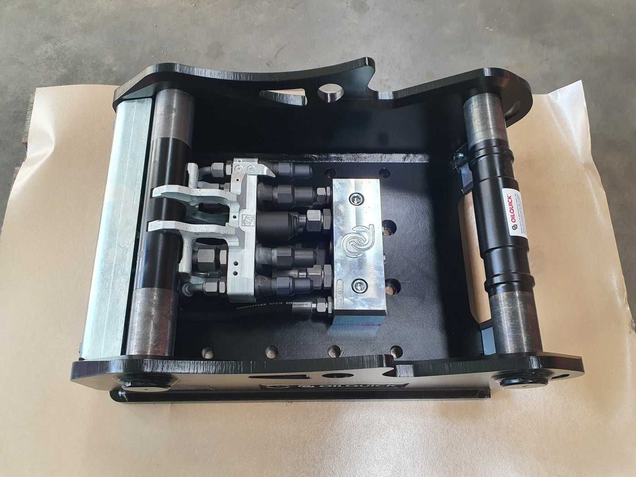 OilQuick OQ65 Adapterplatte für Westtech & mehr - Quick coupler: picture 1 OilQuick OQ65 Adapterplatte für Westtech & mehr - Quick coupler: picture 1