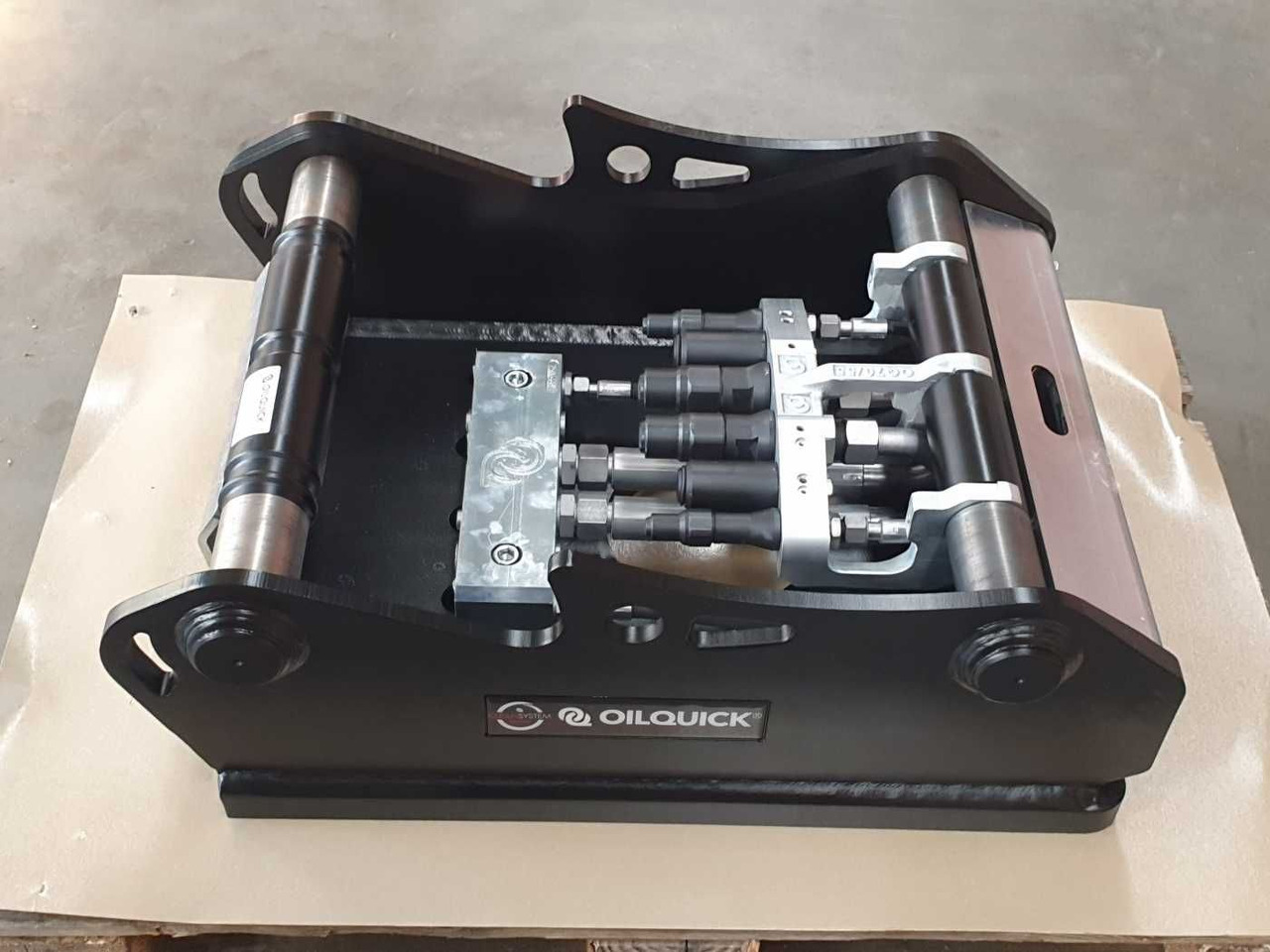 OilQuick OQ70/55 Adapterplatte für Westtech NEU - Quick coupler: picture 1 OilQuick OQ70/55 Adapterplatte für Westtech NEU - Quick coupler: picture 1