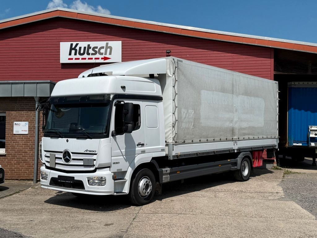 Mercedes-Benz Atego 1530L gr. Fhs. Pritsche / Plane + LBW - Curtainsider truck: picture 1 Mercedes-Benz Atego 1530L gr. Fhs. Pritsche / Plane + LBW - Curtainsider truck: picture 1