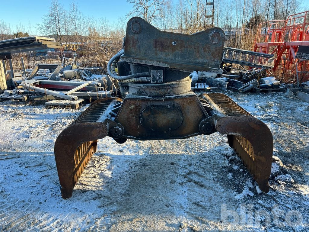 Caterpillar Oilquick - Grapple: picture 1 Caterpillar Oilquick - Grapple: picture 1